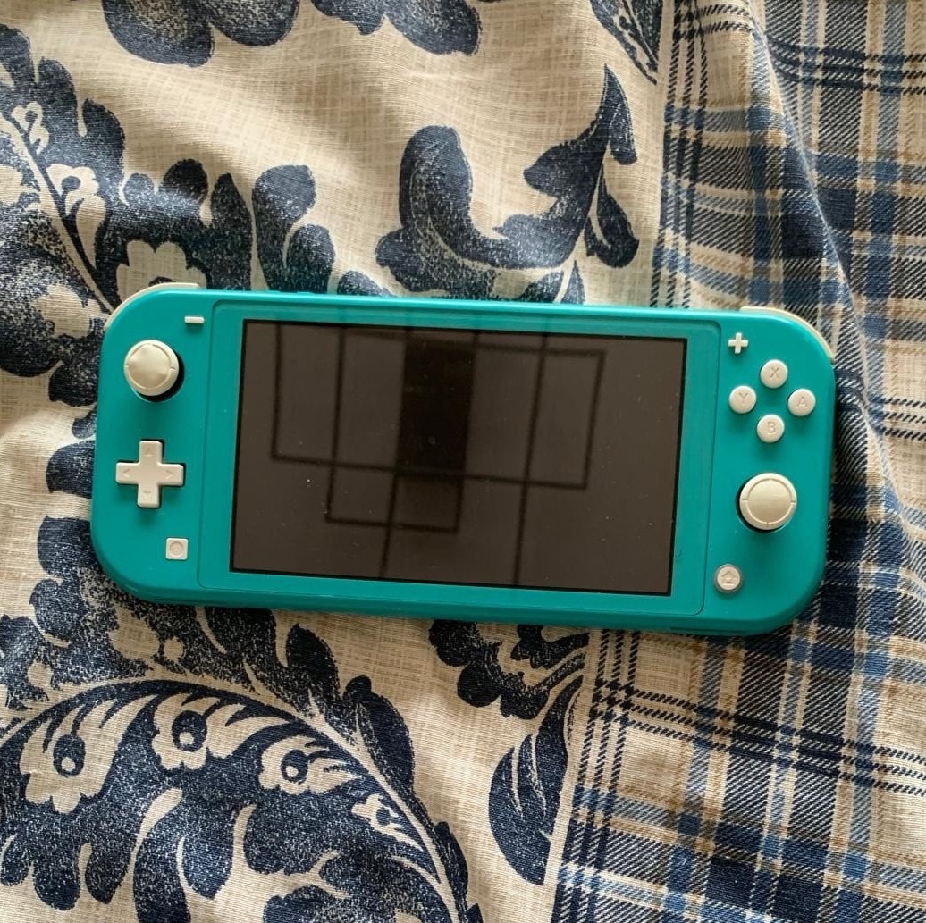 Nintendo Switch Lite Turquoise Handheld Console w/ Carry Case & 2 Games