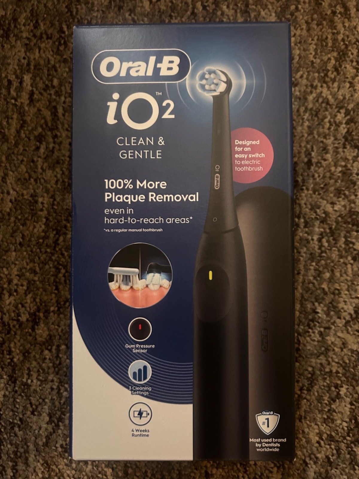 Black oral b io2 electric toothbrush