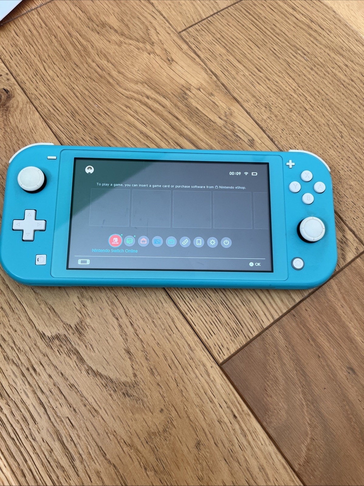 Nintendo Switch Lite 32GB, Turquoise Blue, Handheld Gaming System with Charger