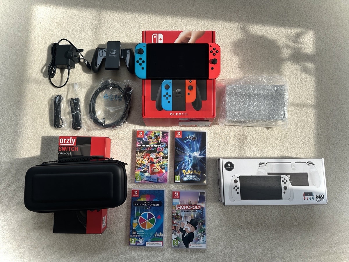 Nintendo Switch OLED Model Bundle - Red/Blue Joy-Cons + Games + Accessories