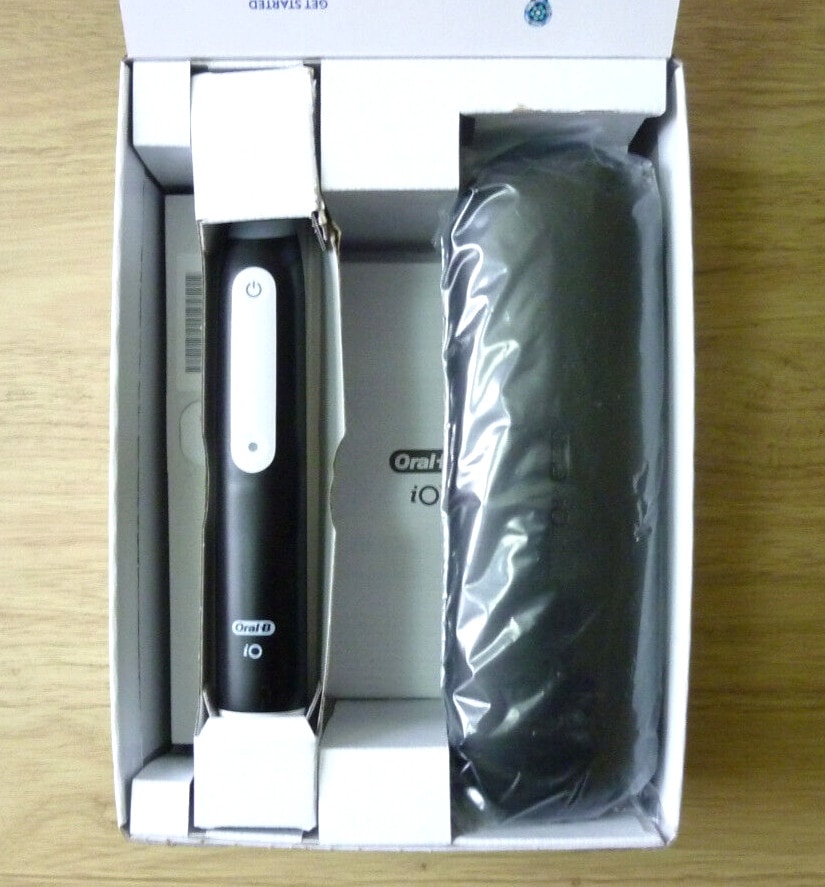 Oral-B iO3 Rechargeable Toothbrush, with case. Black. Box opened, no brush head.