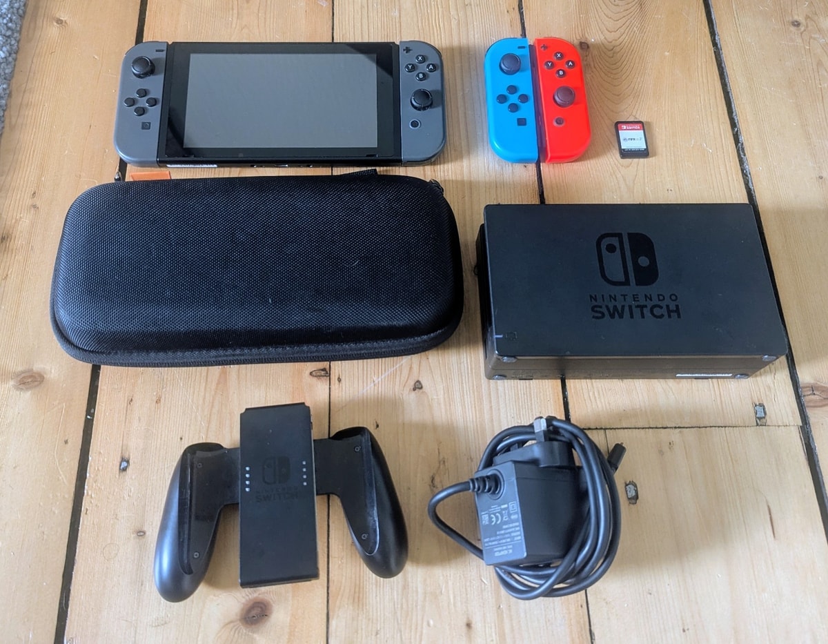 Nintendo Switch 32GB Grey Console with Dock + Game + Extra Joycons