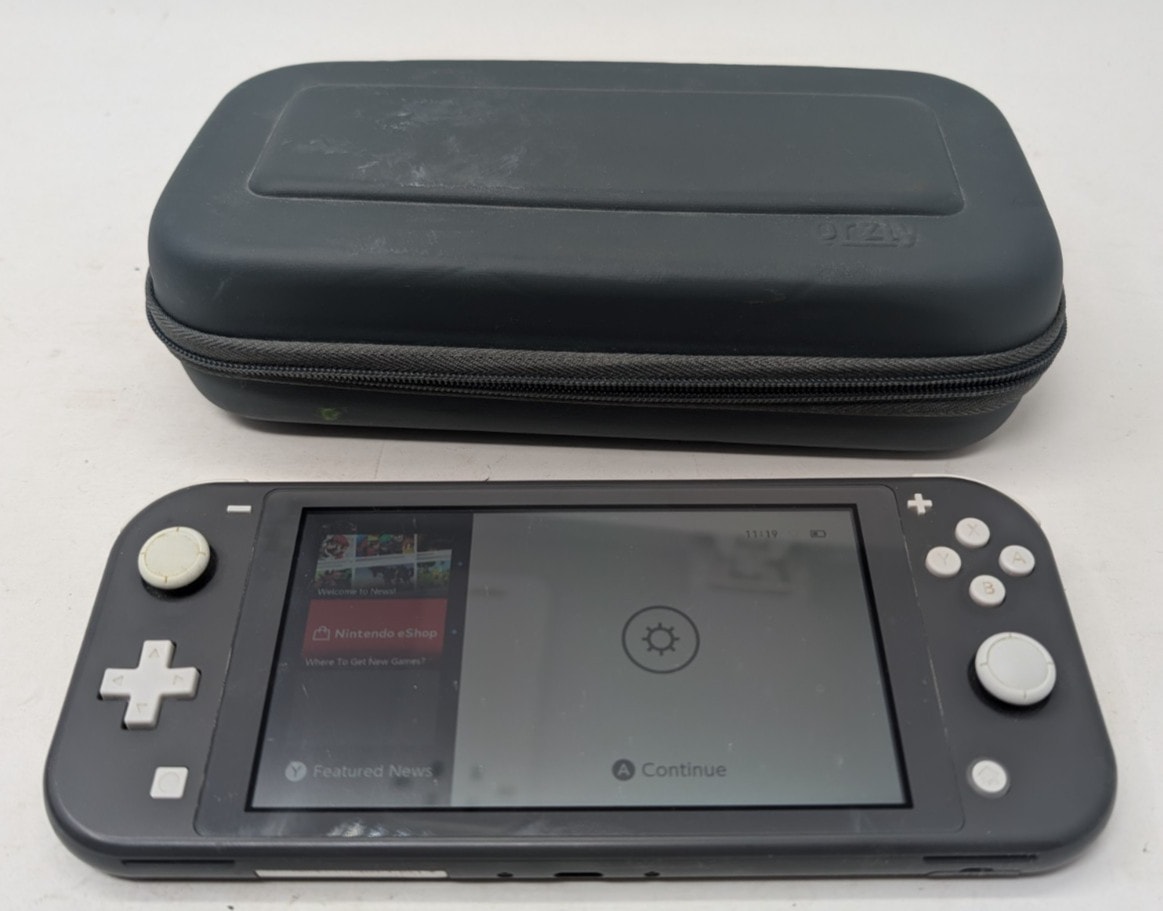Nintendo Switch Lite Console in grey with case - fully working