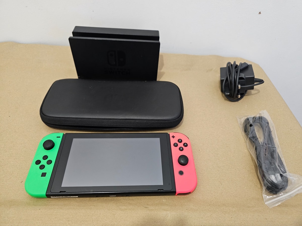 Nintendo Switch Console 32gb + Case + Green & Orange Joy Cons Mark On Screen