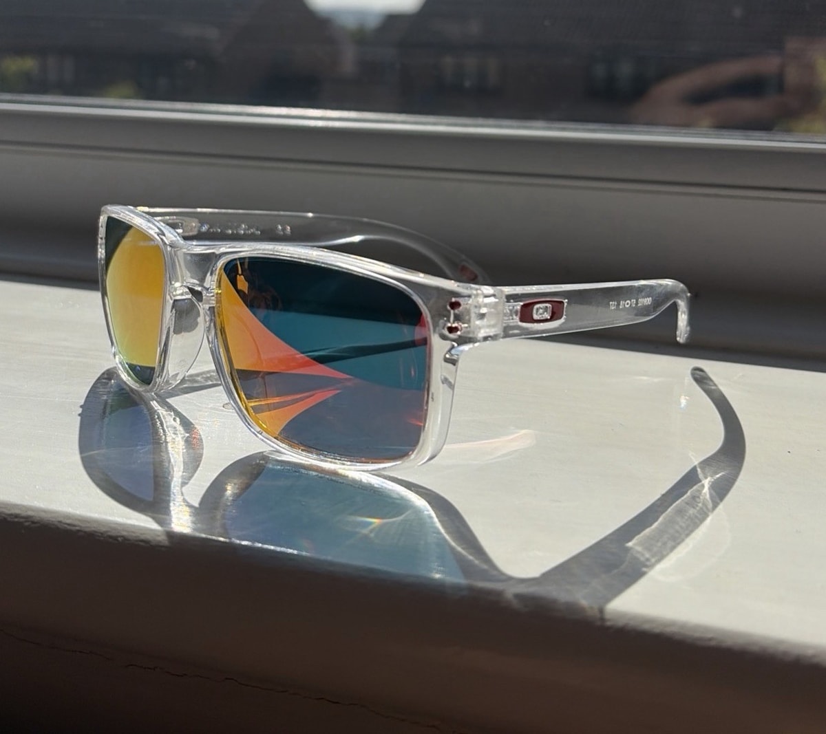 Oakley Holbrook OO9102 Men's Sunglasses Clear Plastic Frame Red Mirrored