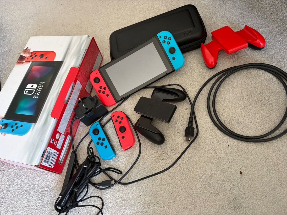Nintendo Switch Neon Red/Blue with 256GB microSD, Case and Extras