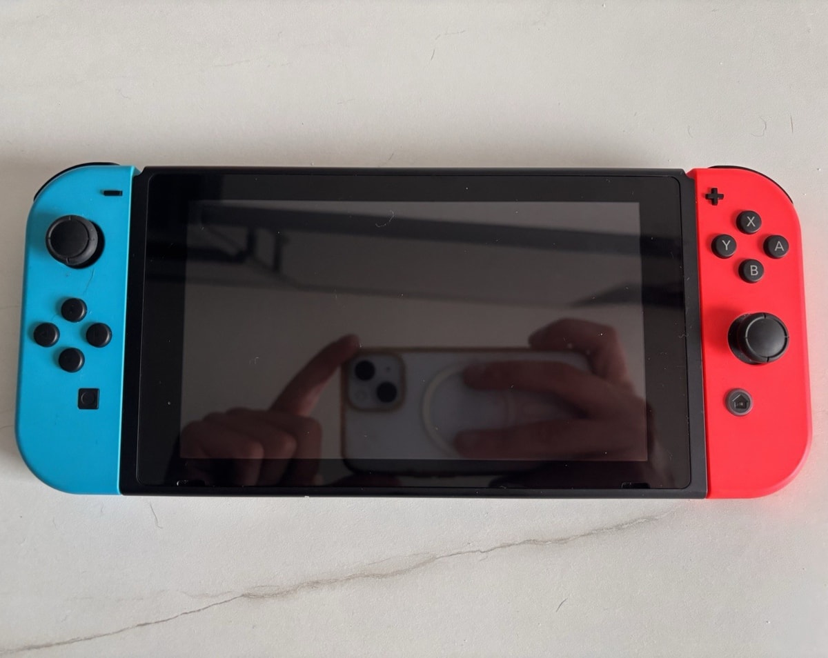 Nintendo Switch Console HAC-001 w/ Neon Red/Blue Joy-Con, 32GB, Wi-Fi