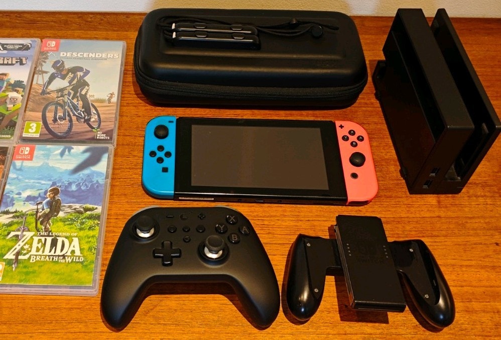Nintendo Switch, improved battery model , 3 games, upgraded controller case dock