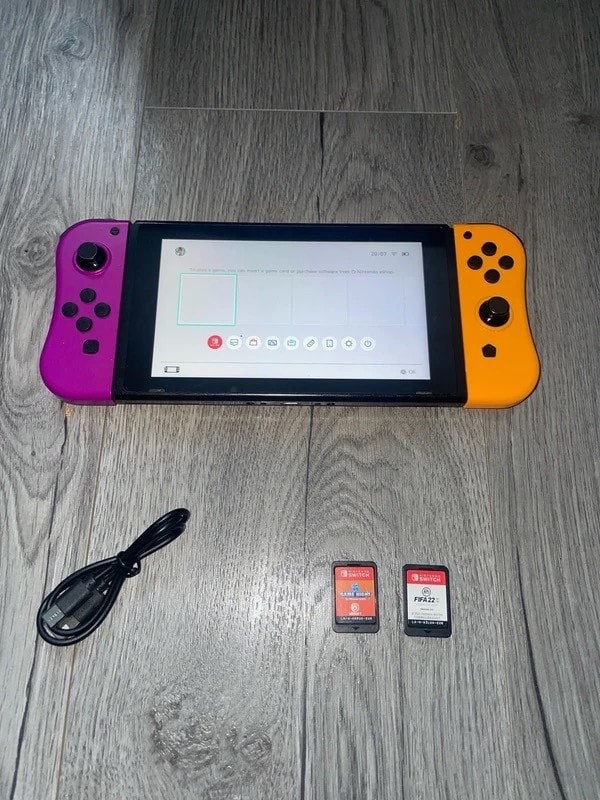 Nintendo Switch 32GB HAC-001(-01) Neon Purple and Neon Orange controller Bundle