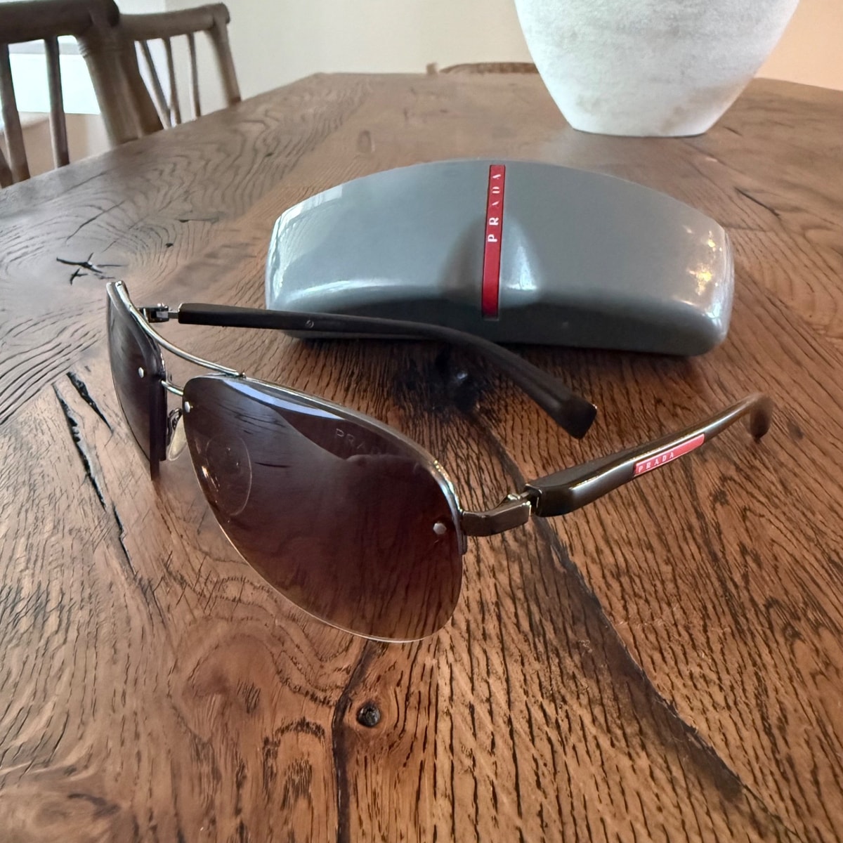 Prada Sport Linea Rossa SPS56M Sunglasses. 5AV6S1 - Gunmetal/Brown Gradient. 62