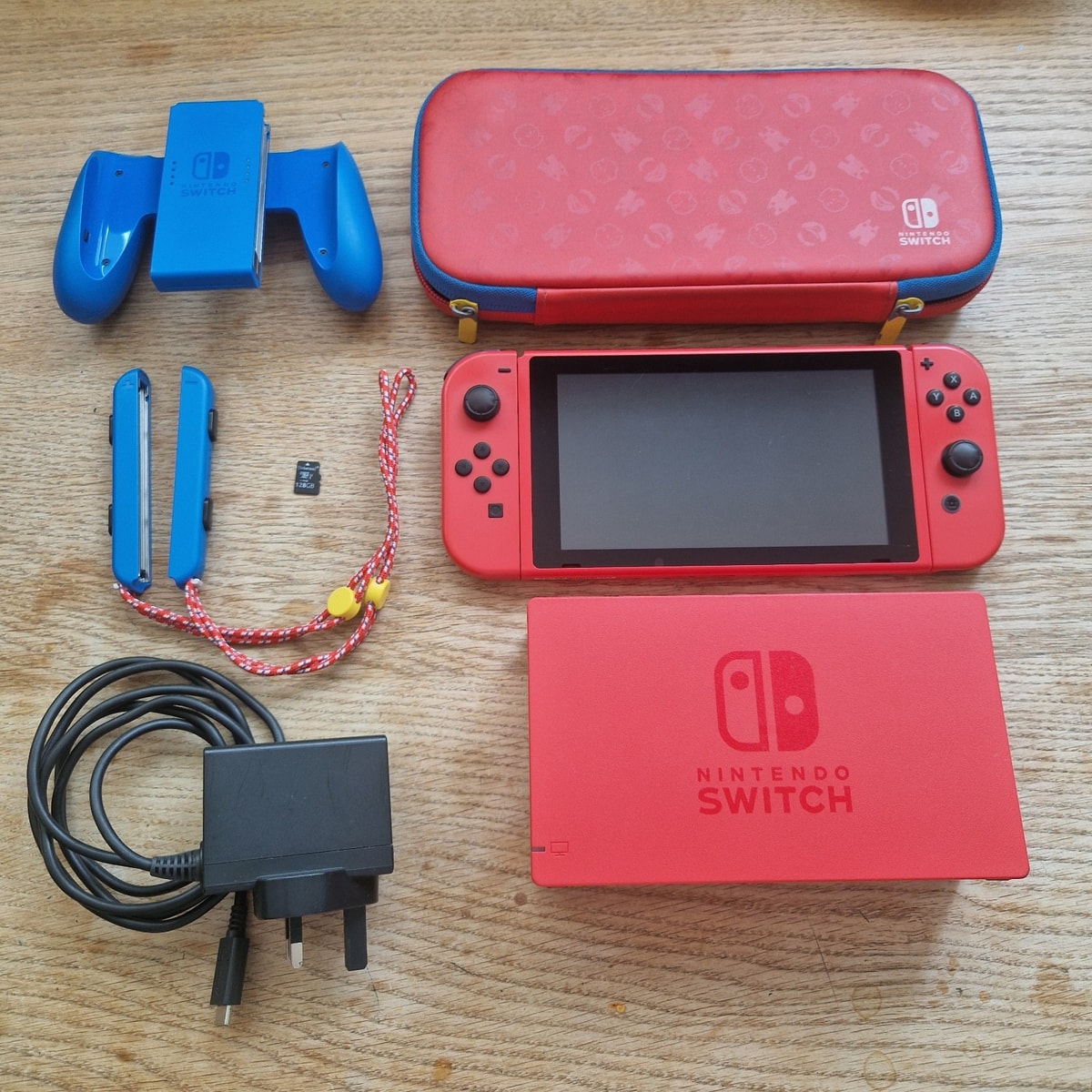 Mario edition Nintendo Switch Console, SD card and accessories