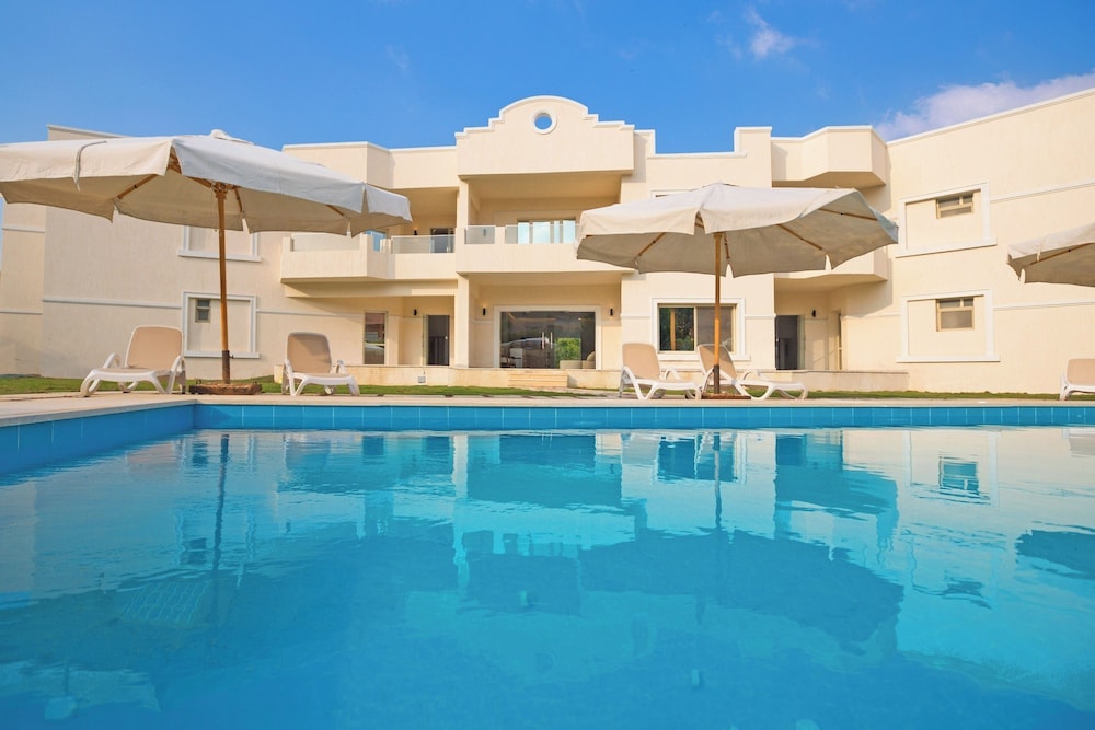 Madinat Sittah Uktobar - Seven Stays Zayed