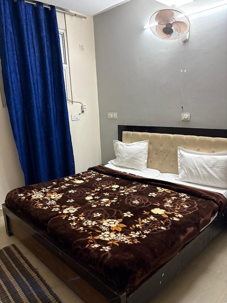 Noida - ICY WHITE STAY HERE